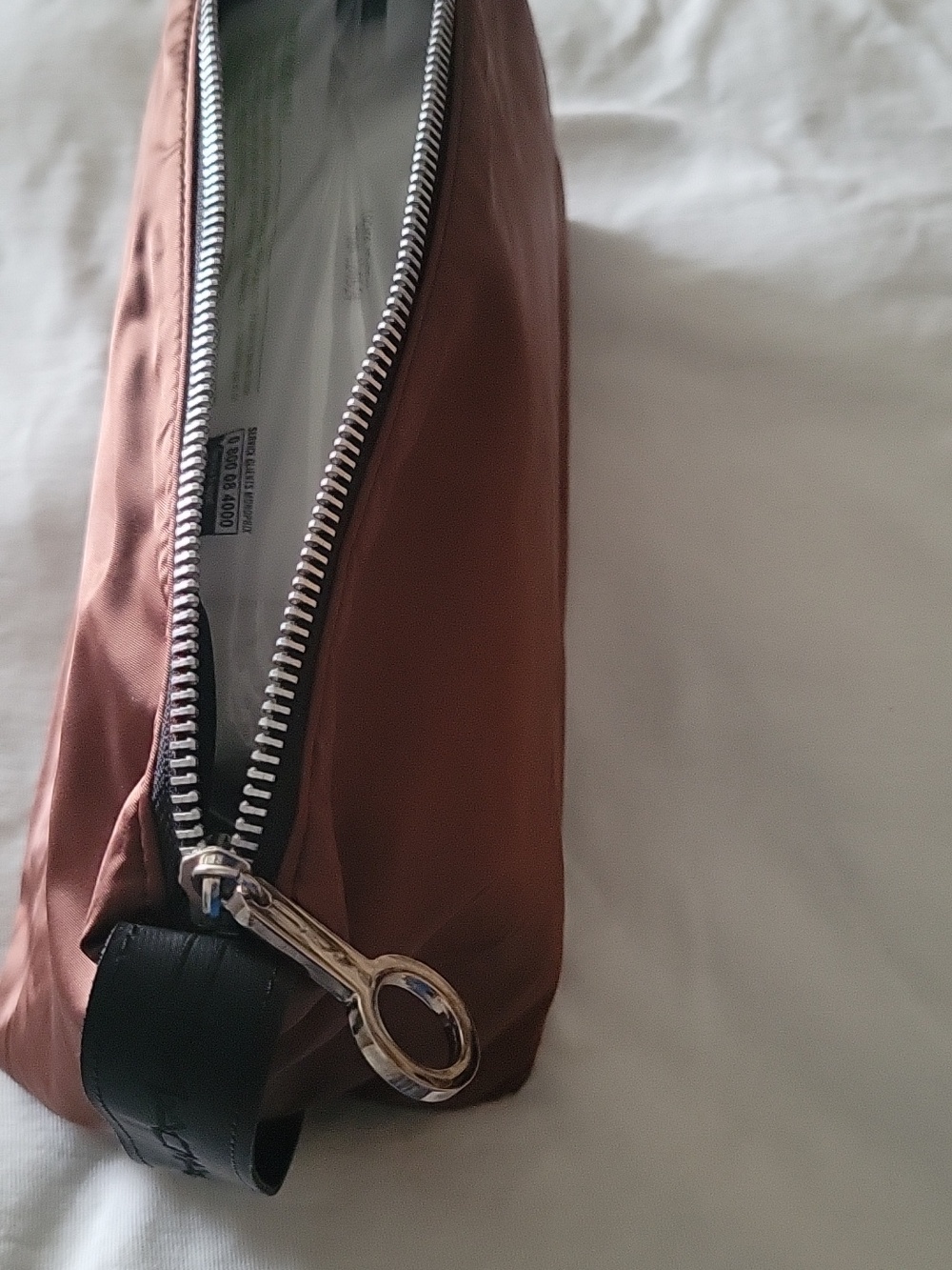 Mac Makeup case in brown.